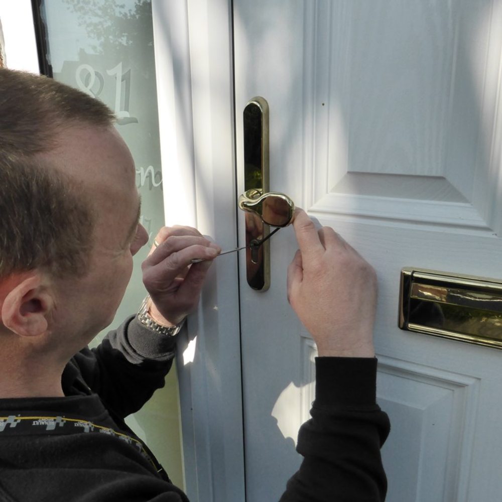 Locksmith Caledonia expert doing locksmith services.